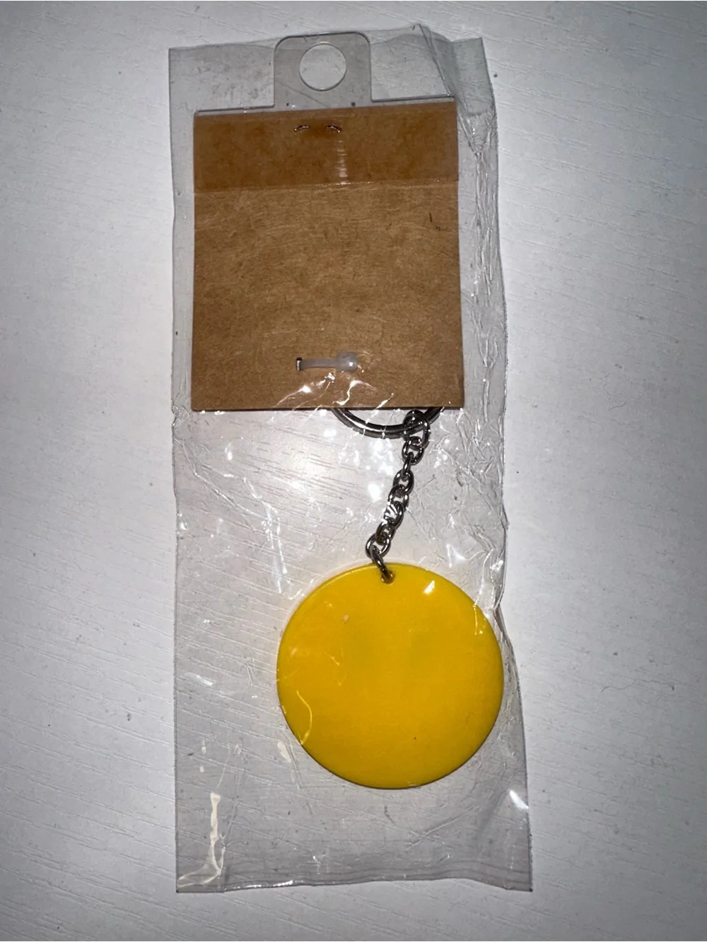 Brandy Melville Smiley Face Keychain